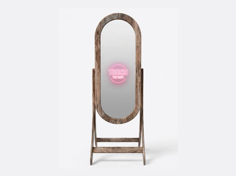 A full-length oval Magic Mirror photo booth with a rustic, distressed wood frame and a neon "Touch the Best" prompt against a white background.