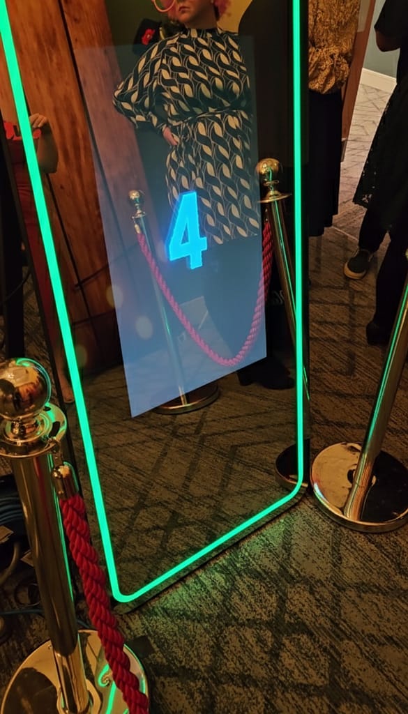 Bring the VIP energy to your event with our glowing LED mirror booth and iconic red carpet entrance.